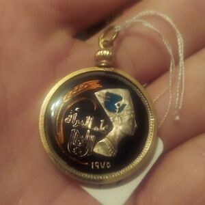 Egyptian Revival Vermeil Coin Pendant which features a Bust Of Nefertiti. 1975